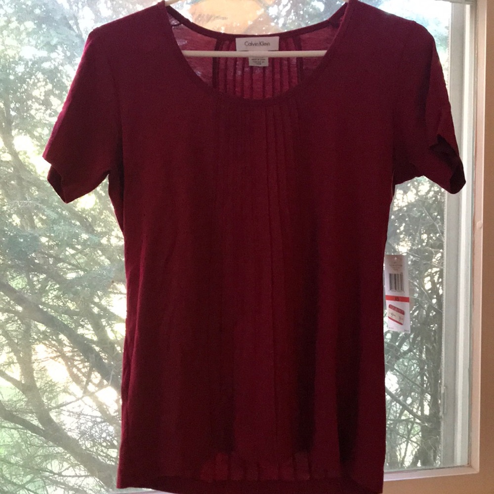 Calvin Klein dressy shirt sleeve top.